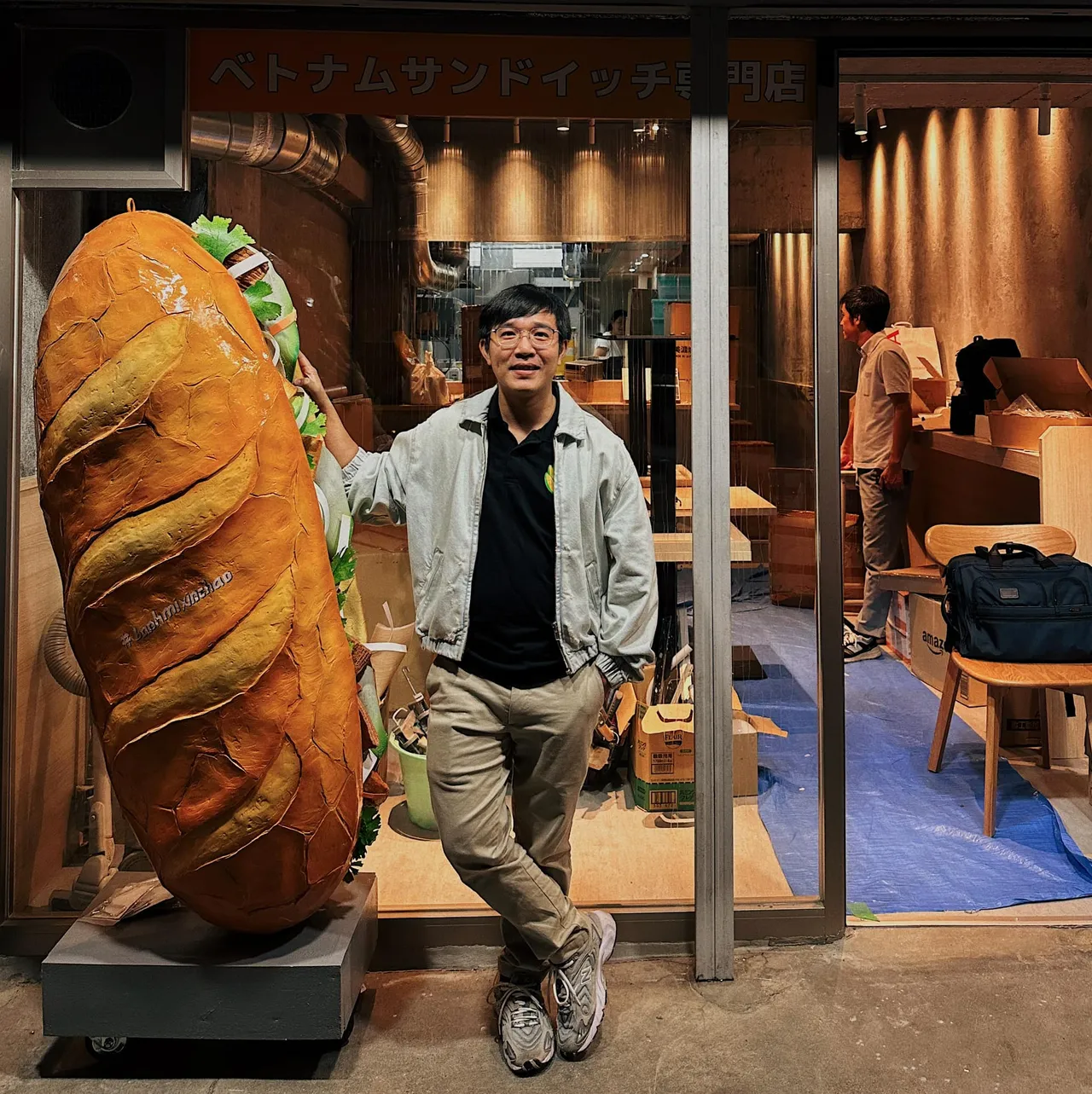 A "giant" banh mi model is placed right in front of the BMXC OKUBO shop. Photo: Quy Dang