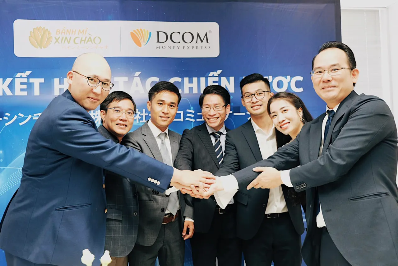 Leadership and shareholders of BMXC and DCOM Money Express. Photo: Quy Dang
